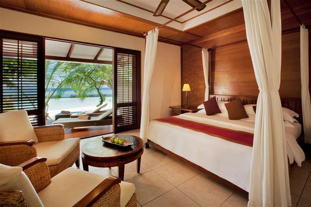 Kuramathi Deluxe Beach Villa — luxury villa photo 1