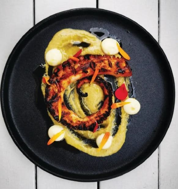 Grilled Octopus with Yellow Harissa, Aioli and Edible Flower Petals