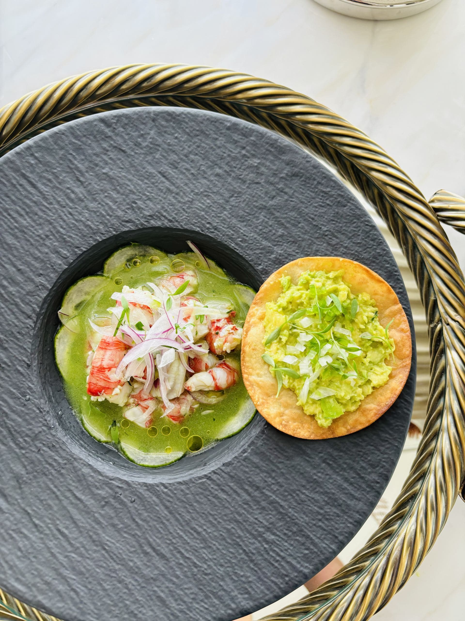 Aguachile of shrimp with jalapeno and tostada with guacamole