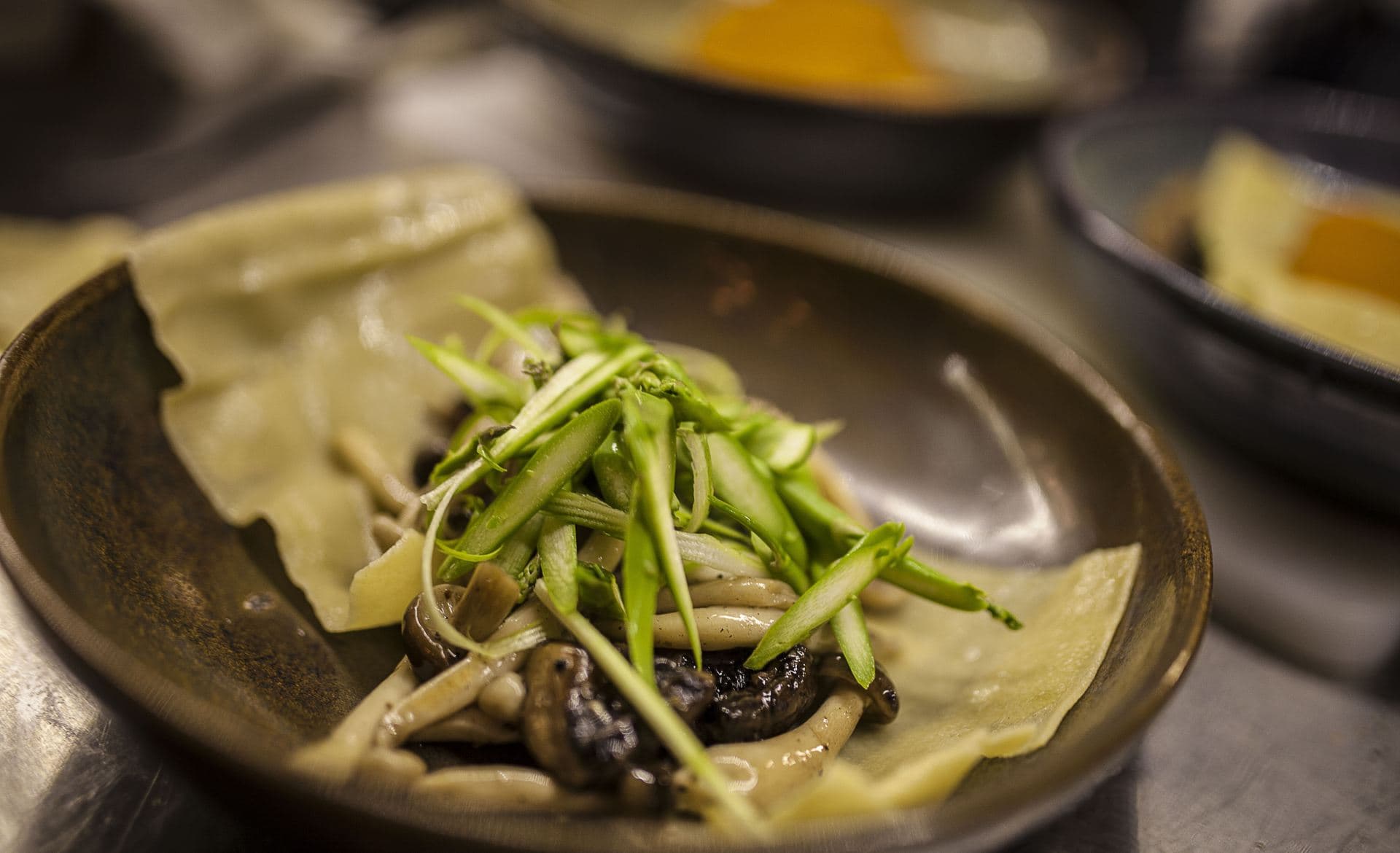 Homemade open Lasagna with willed mushroom and green asparagus